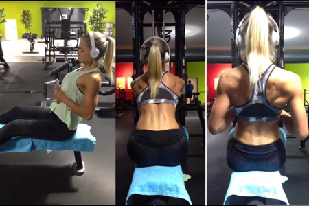 Bikini Athletin Nicole beim Rudern im Sitzen